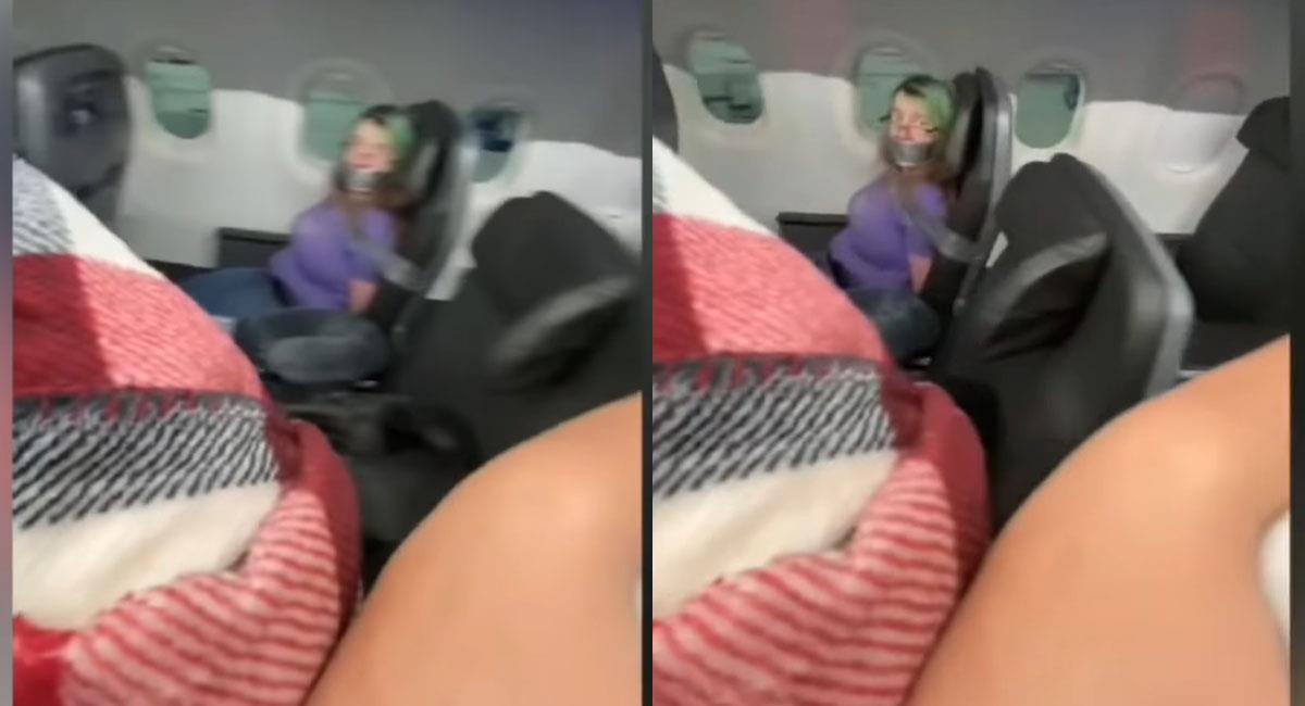 Amarran a mujer a asiento de avión y se vuelve viral. Foto: Youtube